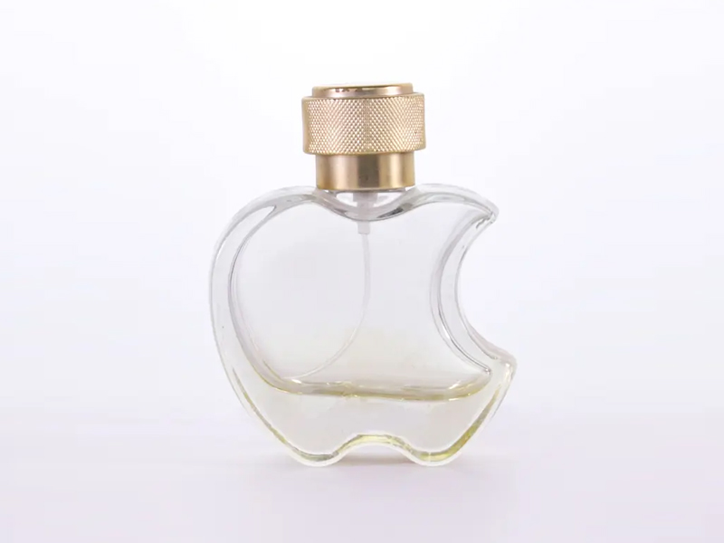 Botellas de perfume en forma de manzana