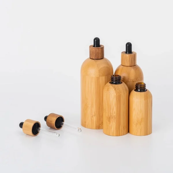 Botellas cuentagotas de vidrio con cubierta de bambú recargable vacía para bomba de perfume de aceite esencial