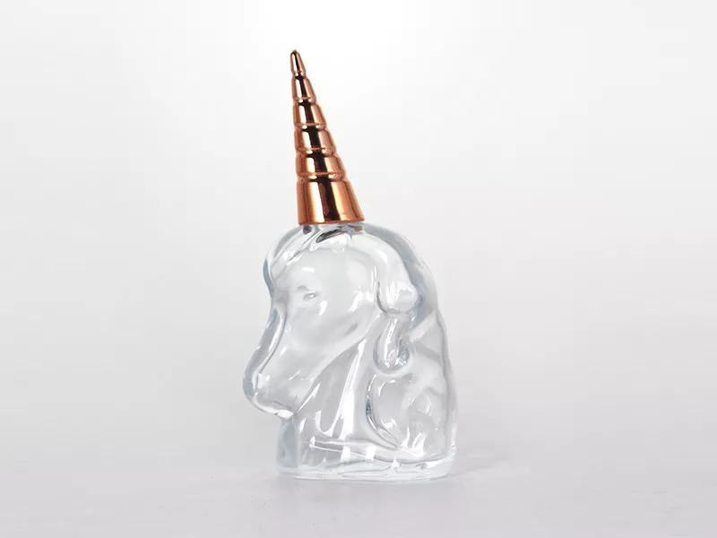 Botella de perfume en forma de unicornio